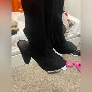 Black boots with peekaboo toes